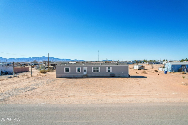 view of front facade featuring a mountain view