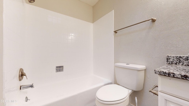 full bathroom with vanity,  shower combination, and toilet