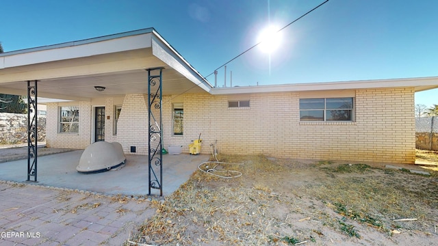 rear view of house with a patio area