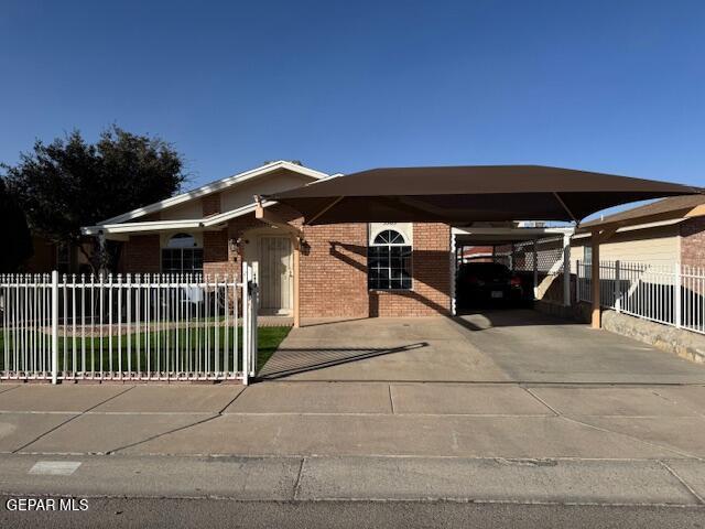 view of front of house featuring a carport