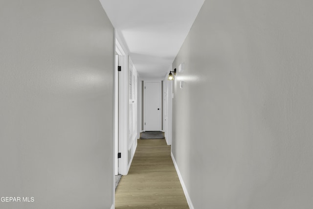 hallway featuring light wood-type flooring