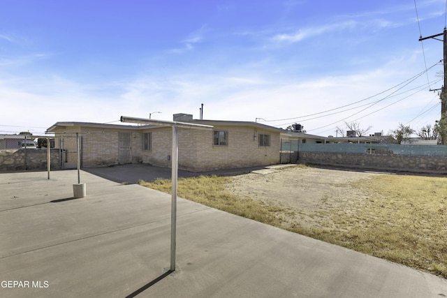 rear view of property with a patio