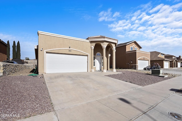 view of front of property featuring a garage