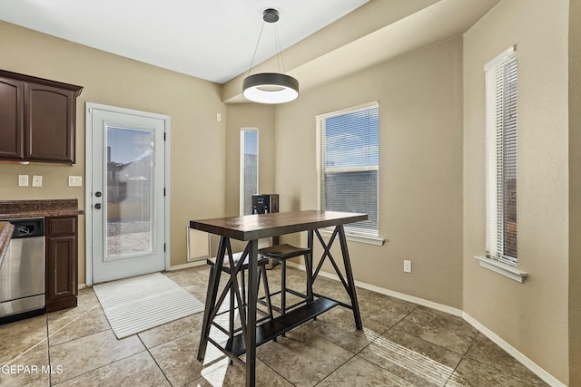 dining room with light tile patterned flooring