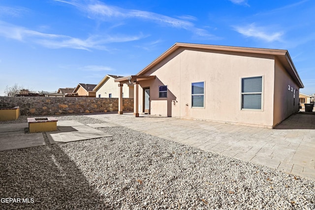 rear view of house with a patio area