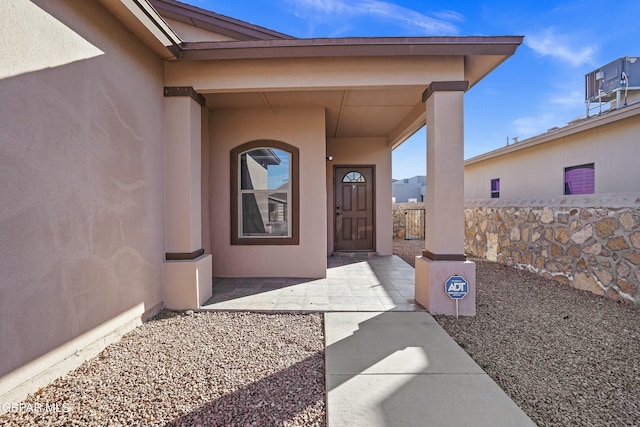 entrance to property with a patio area