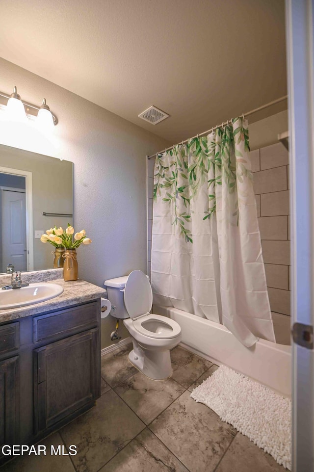 1009 Earthstar Pl, El Paso, TX 79928 - bathroom with shower / bath combo with shower curtain, visible vents, vanity, and toilet