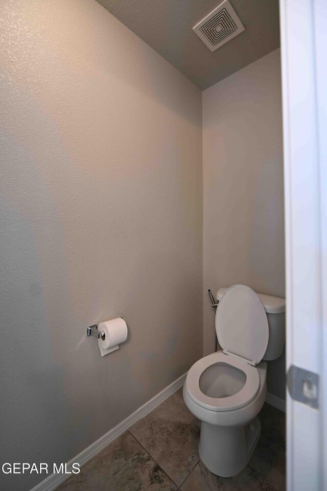1009 Earthstar Pl, El Paso, TX 79928 - bathroom featuring tile patterned flooring, visible vents, toilet, and baseboards