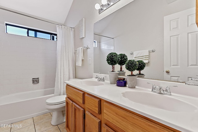 bathroom featuring double vanity, shower / tub combo, a sink, and tile patterned floors