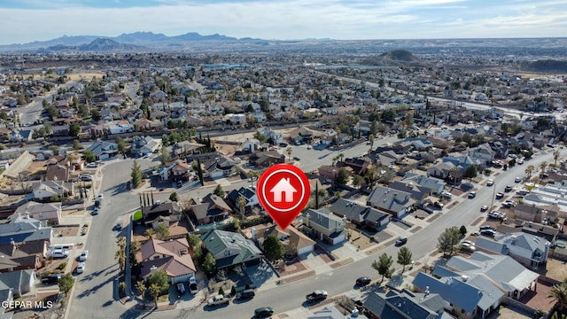 birds eye view of property featuring a residential view and a mountain view