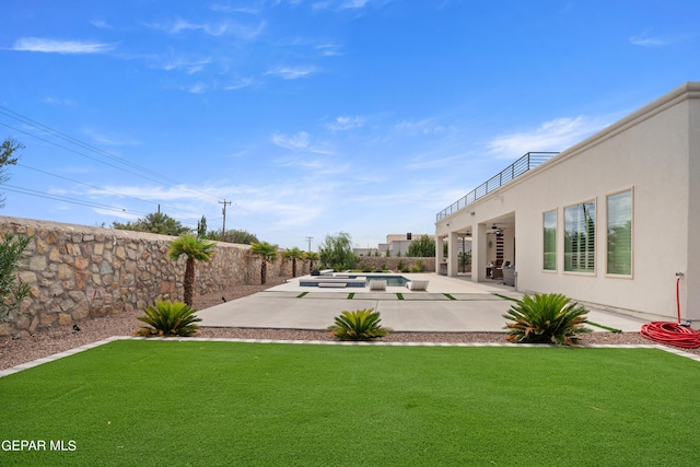 view of yard with a patio, a fenced backyard, and a fenced in pool