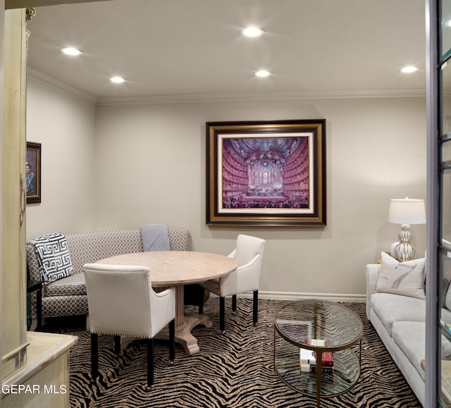 carpeted dining area featuring baseboards, recessed lighting, and crown molding