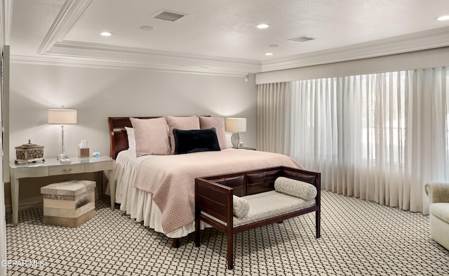 bedroom with visible vents, light colored carpet, and ornamental molding