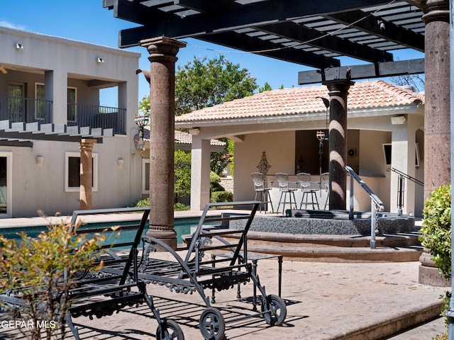 exterior space with a pergola and an outdoor pool