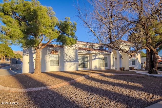 view of front of property featuring stucco siding