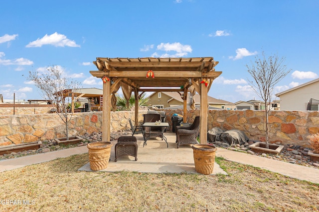 view of patio featuring an outdoor hangout area and a pergola