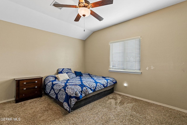 bedroom with vaulted ceiling, carpet flooring, and ceiling fan