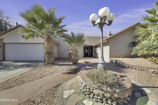 ranch-style home with a garage