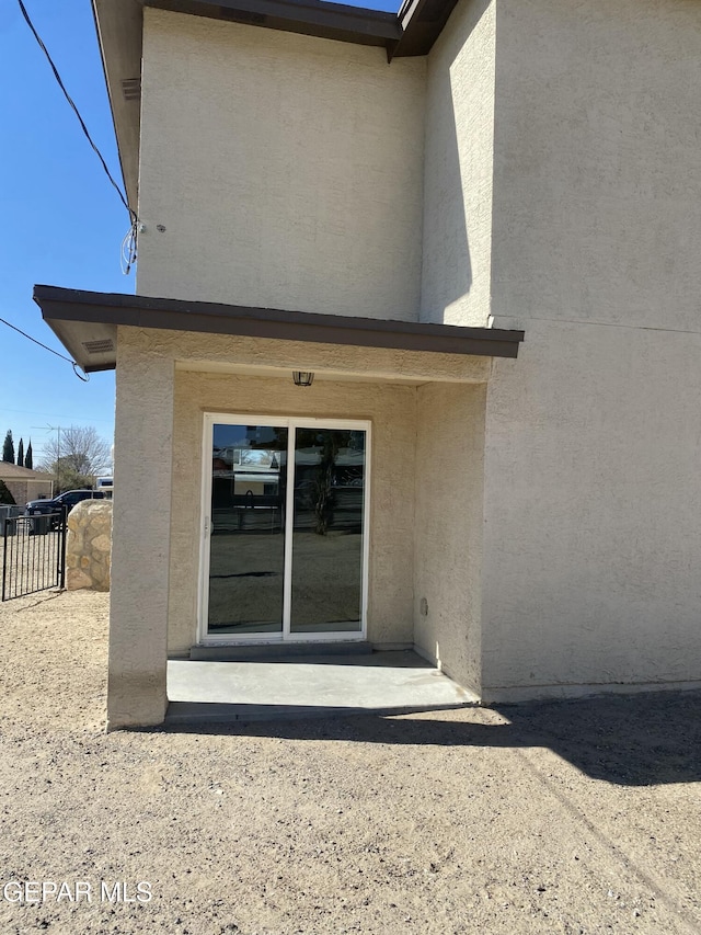 rear view of house featuring a patio