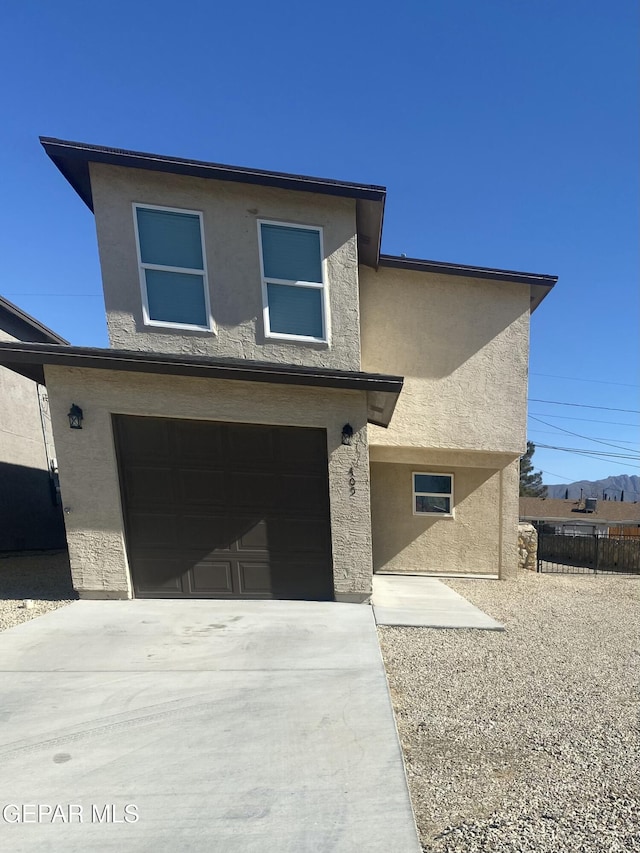 view of front of home featuring a garage