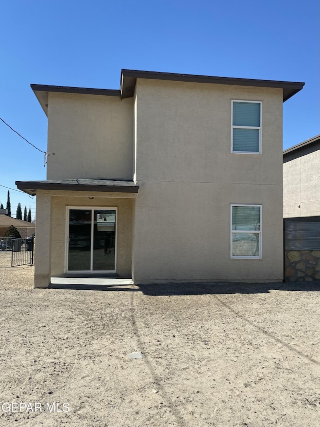 rear view of house featuring a patio area