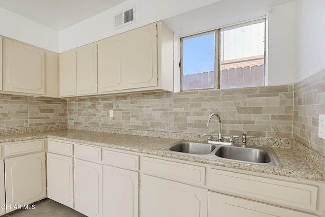 kitchen with sink and backsplash