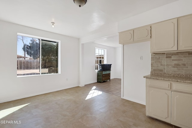 kitchen featuring tasteful backsplash