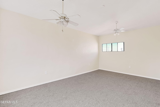 empty room with carpet floors and ceiling fan