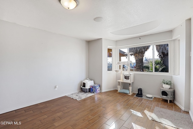 empty room with a textured ceiling