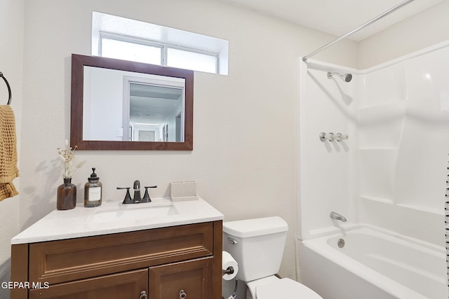 full bathroom with shower / bath combination, vanity, and toilet