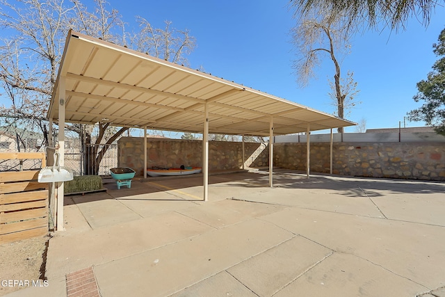 view of patio / terrace with a carport