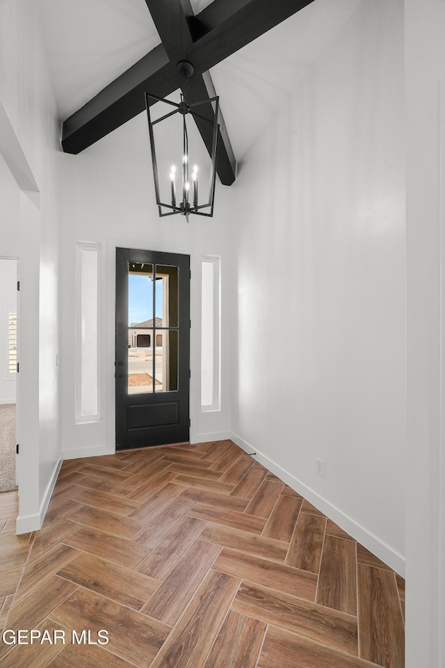 entryway featuring high vaulted ceiling, an inviting chandelier, baseboards, and beamed ceiling