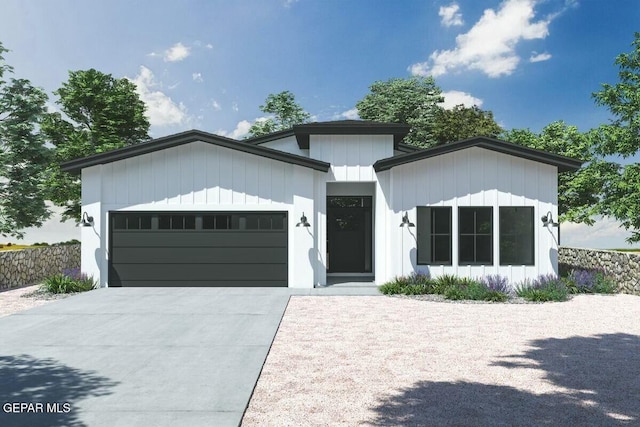 view of front of home featuring a garage and driveway