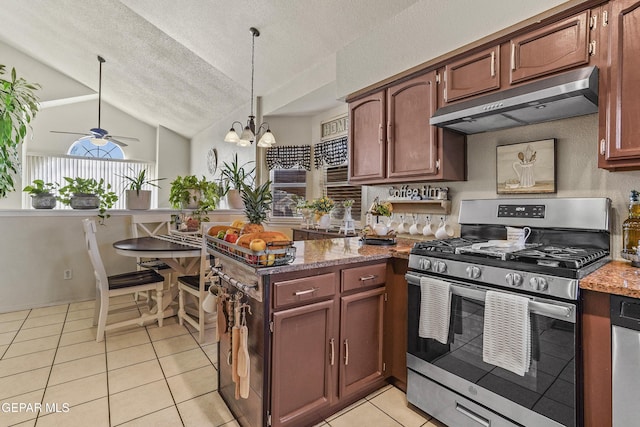 kitchen with vaulted ceiling, a textured ceiling, hanging light fixtures, light tile patterned floors, and appliances with stainless steel finishes