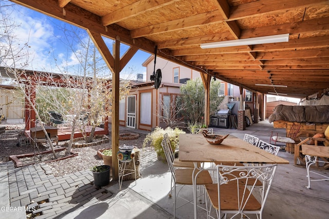 view of patio with an outdoor structure