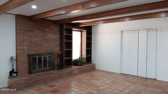 8808 Cosmos Ave, El Paso, TX 79925 - unfurnished living room with beam ceiling, a fireplace, and recessed lighting