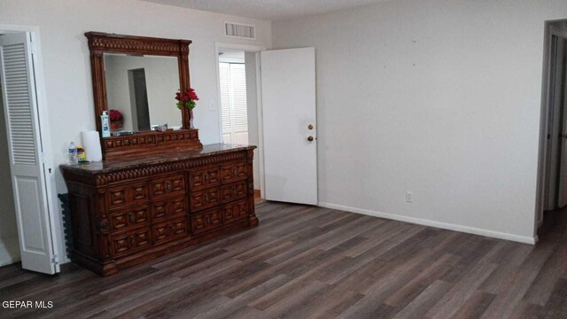 8808 Cosmos Ave, El Paso, TX 79925 - bedroom with wood finished floors and baseboards