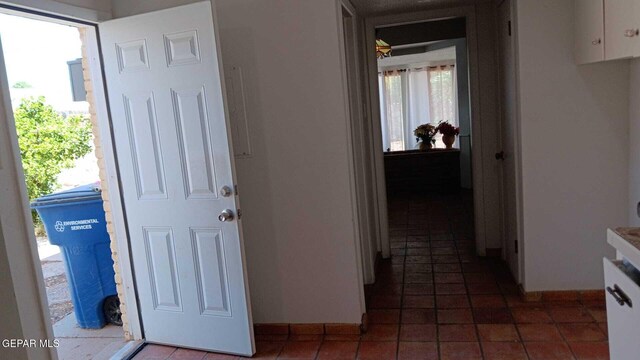 8808 Cosmos Ave, El Paso, TX 79925 - corridor featuring plenty of natural light and baseboards