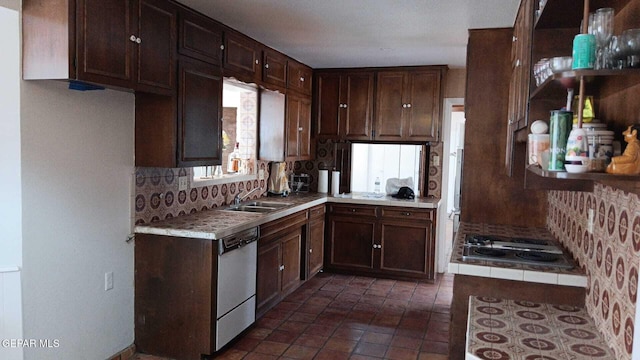 8808 Cosmos Ave, El Paso, TX 79925 - kitchen featuring tile counters, a sink, decorative backsplash, electric stovetop, and stainless steel dishwasher