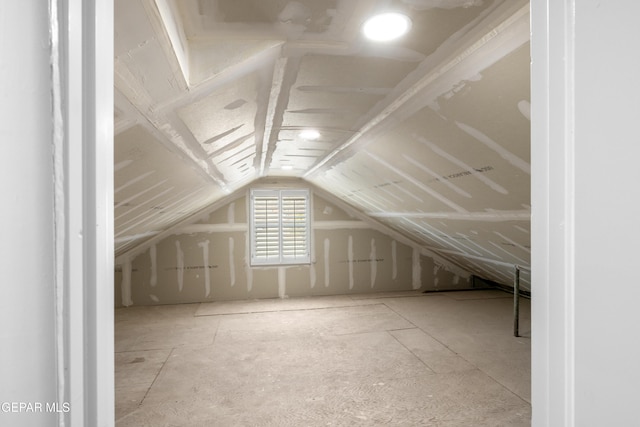 bonus room featuring vaulted ceiling