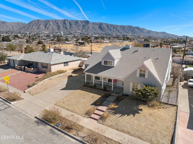 drone / aerial view featuring a mountain view