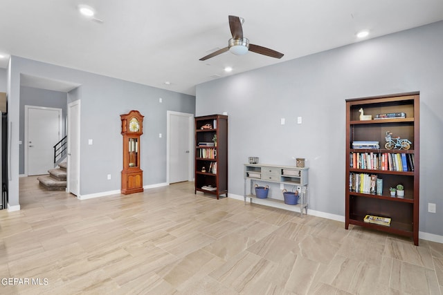 living room featuring ceiling fan