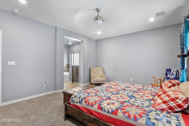 carpeted bedroom featuring ensuite bathroom and ceiling fan