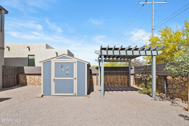 view of outbuilding with a pergola