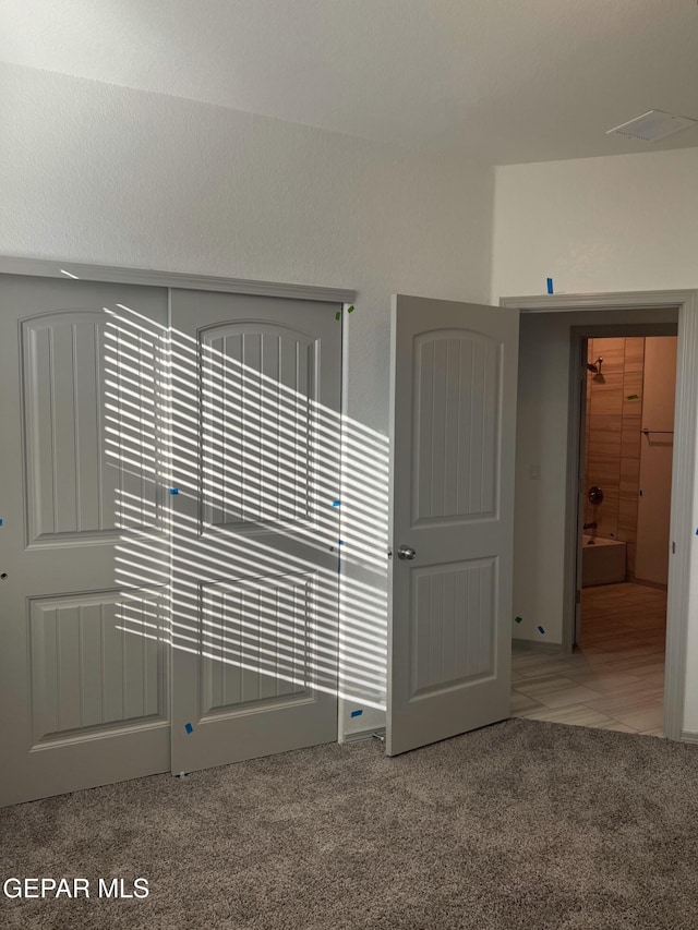 empty room featuring carpet floors