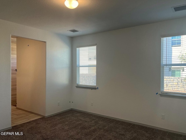 empty room featuring carpet