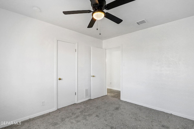 unfurnished bedroom with light carpet and ceiling fan