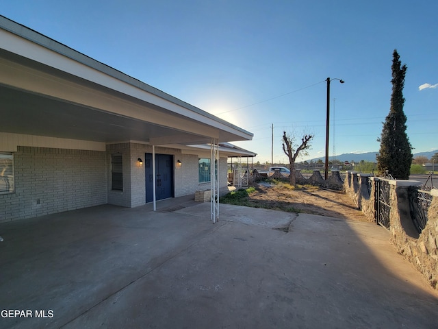 view of patio / terrace featuring a mountain view