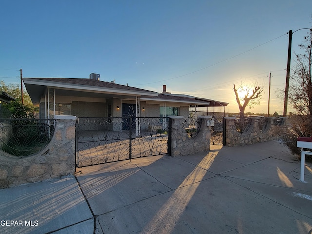 view of front of home with central air condition unit