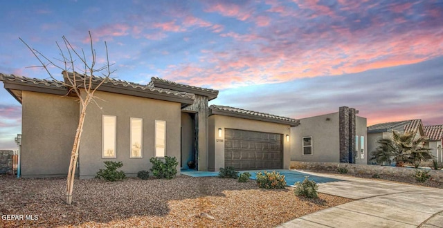 view of front of house with a garage